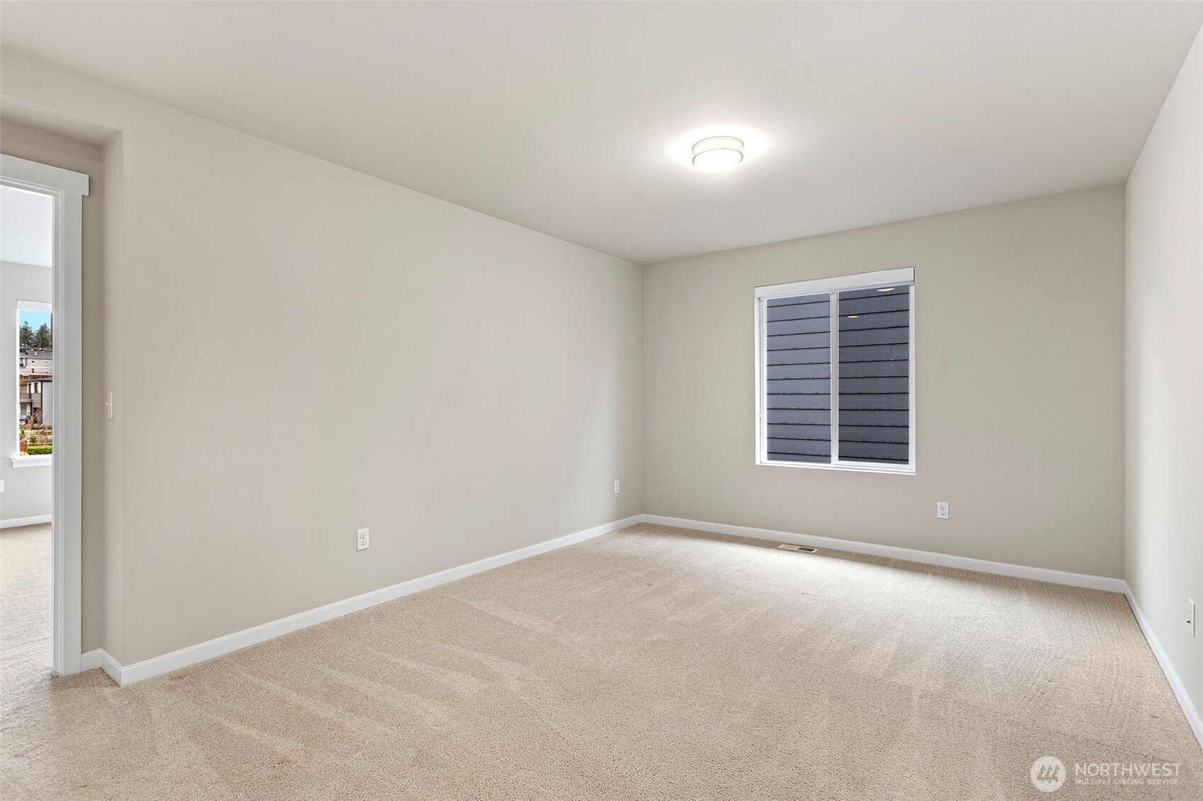 17913 38th Drive Southeast, Unit 20 Bothell, WA 98012 - Photo 15 of 32 an empty room with windows