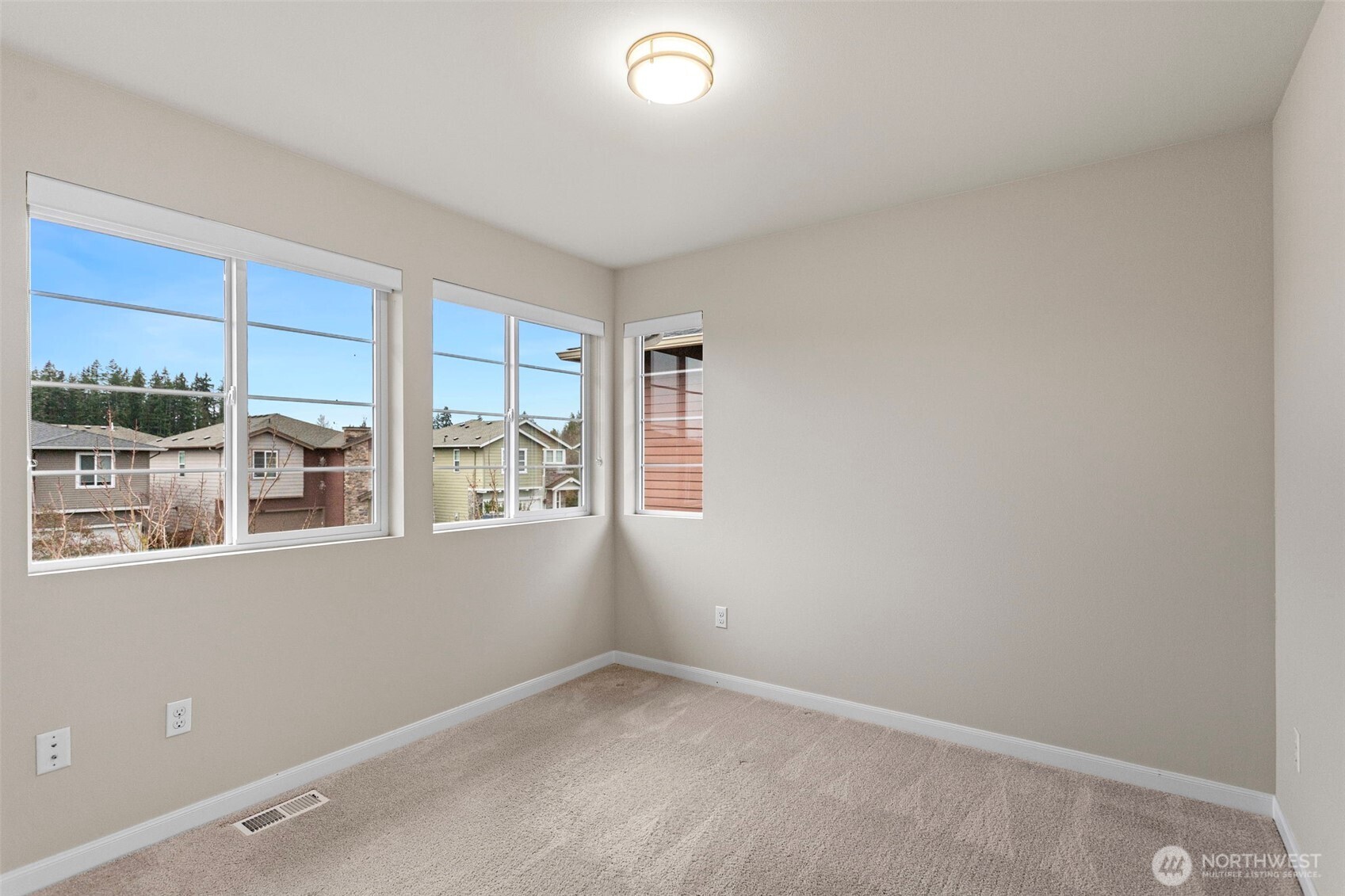 17913 38th Drive Southeast, Unit 20 Bothell, WA 98012 - Photo 17 of 32 an empty room with a window