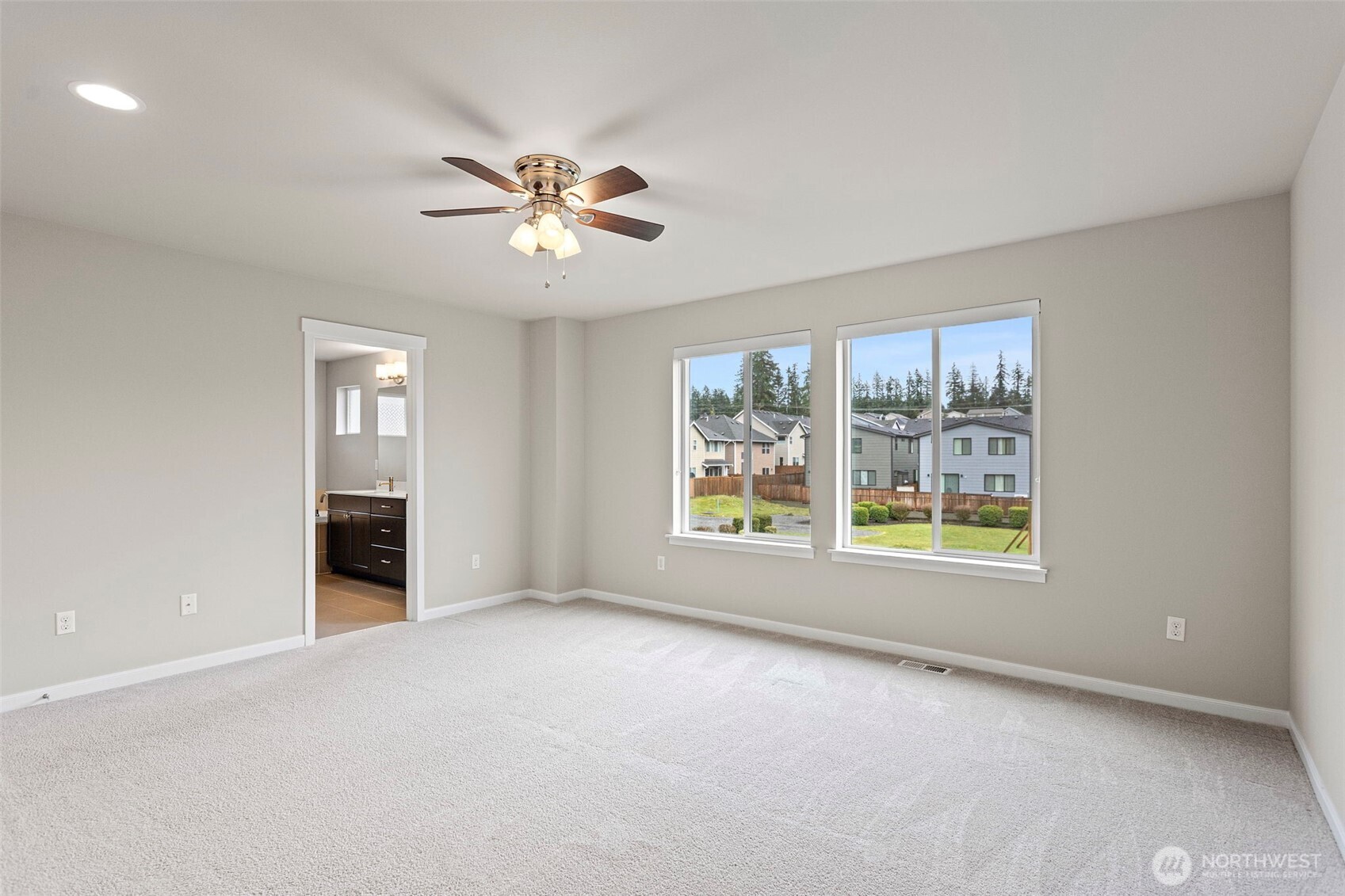 17913 38th Drive Southeast, Unit 20 Bothell, WA 98012 - Photo 22 of 32 a view of an empty room with a window