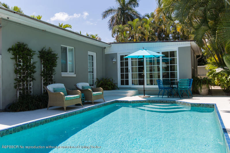 3501 Washington Road West Palm Beach, FL 33405 - Photo 12 of 13 a view of a house with backyard porch and sitting area