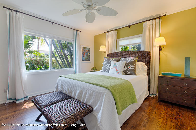 3501 Washington Road West Palm Beach, FL 33405 - Photo 8 of 13 a bedroom with a bed and wooden floor