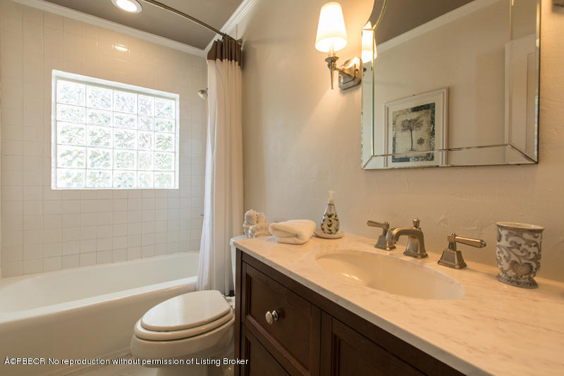 3501 Washington Road West Palm Beach, FL 33405 - Photo 9 of 13 a bathroom with a granite countertop sink toilet and shower