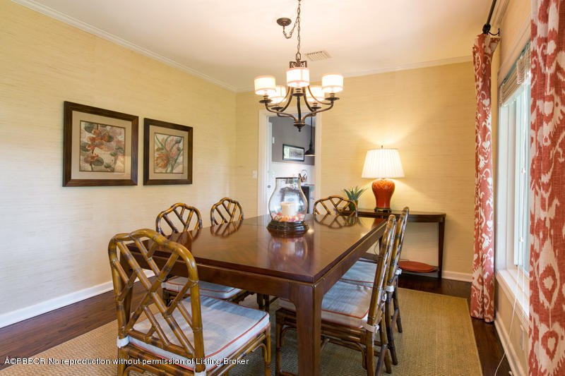 3501 Washington Road West Palm Beach, FL 33405 - Photo 10 of 13 a view of a dining room with furniture and a chandelier