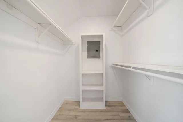 a view of an empty walk in closet