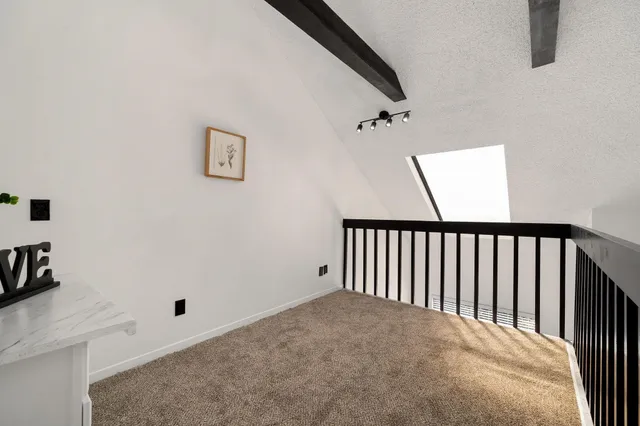 a view of a hallway with closet