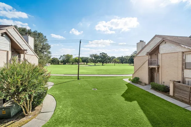 a view of a house with a big yard