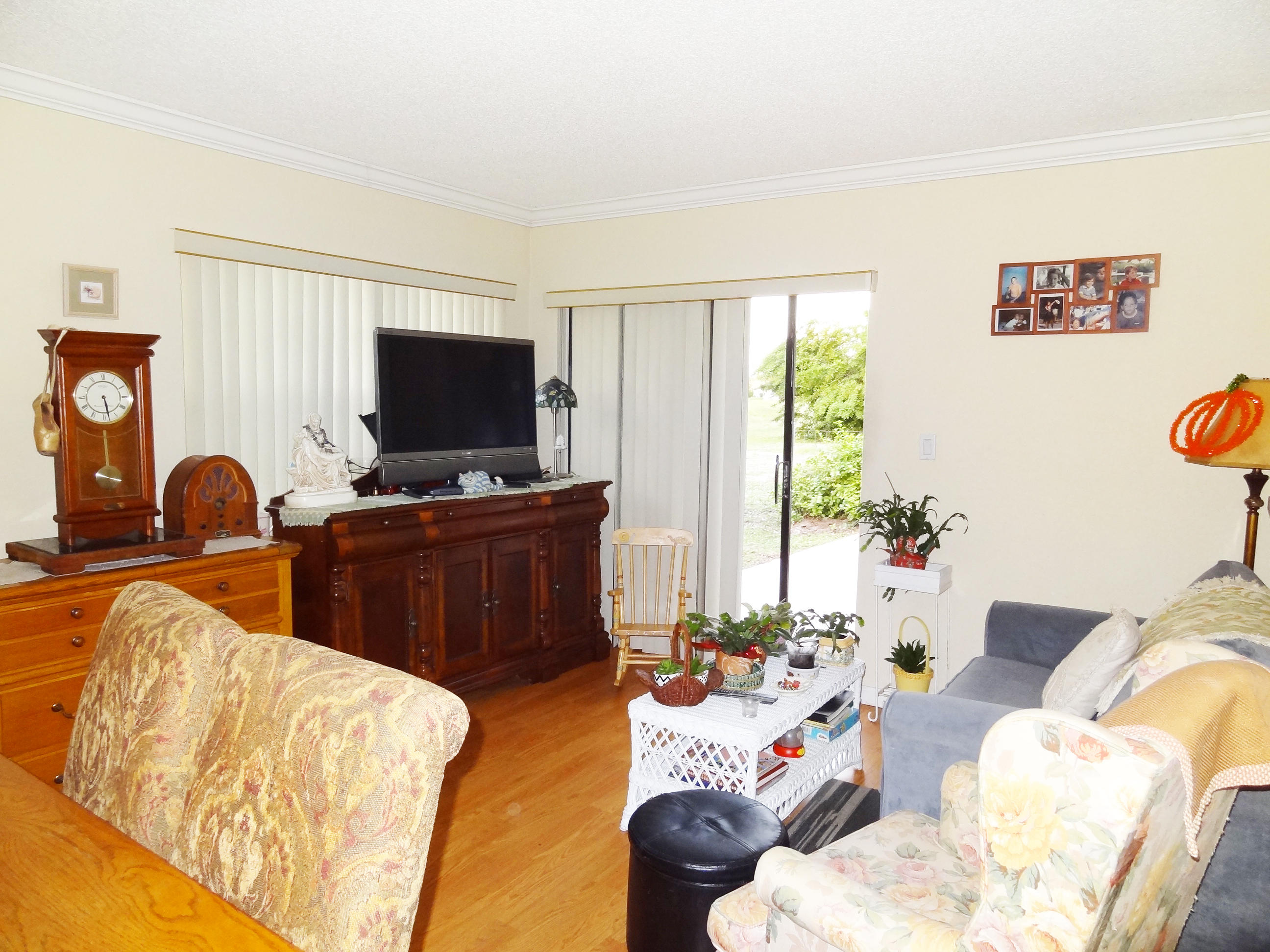 9877 Spanish Isles Drive Boca Raton, FL 33496 - Photo 7 of 11 FAMILY RM OUT TO PATIO