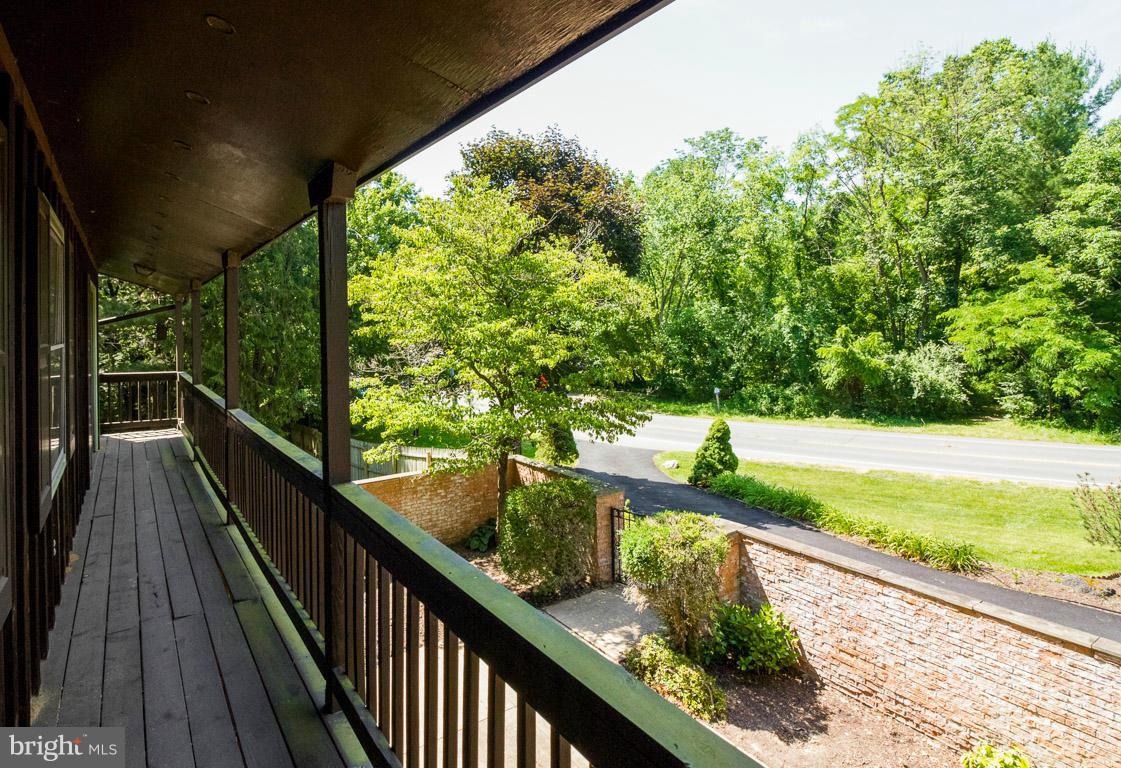 6033 Chesterbrook Road McLean, VA 22101 - Photo 21 of 24 a view of balcony and yard