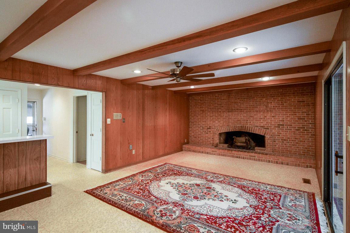6033 Chesterbrook Road McLean, VA 22101 - Photo 10 of 24 a view of an empty room and a fireplace