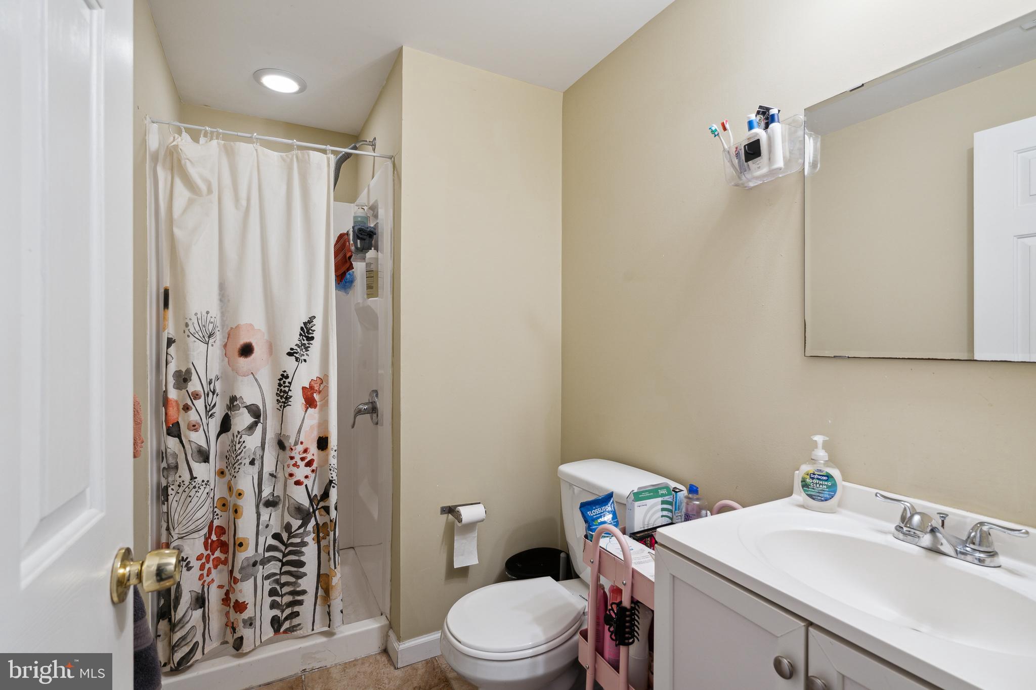1611 North 17th Street, Unit A Philadelphia, PA 19121 - Photo 11 of 19 a bathroom with a sink toilet and shower