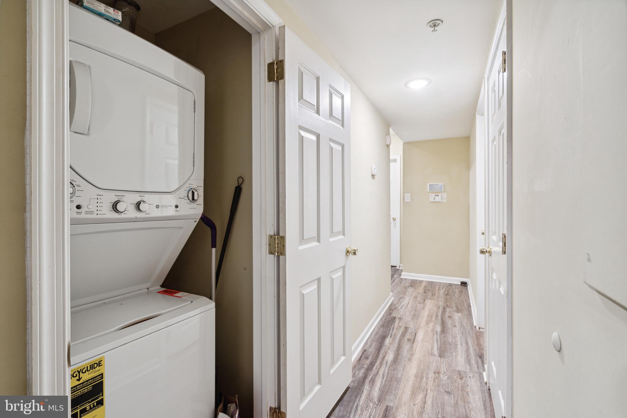 1611 North 17th Street, Unit A Philadelphia, PA 19121 - Photo 16 of 19 a view of a hallway with washer and dryer