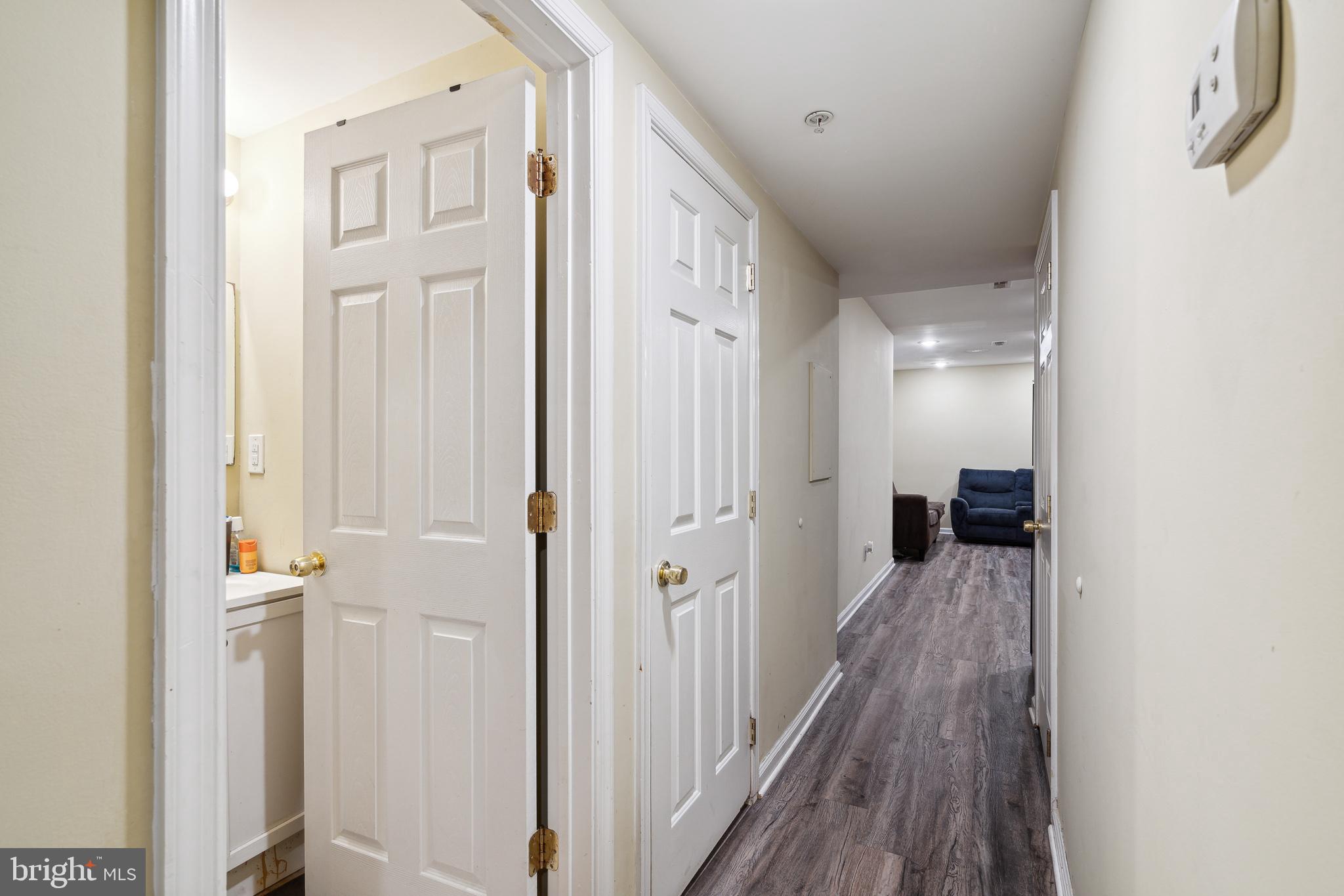 1611 North 17th Street, Unit A Philadelphia, PA 19121 - Photo 7 of 19 a view of a hallway with a hardwood floor