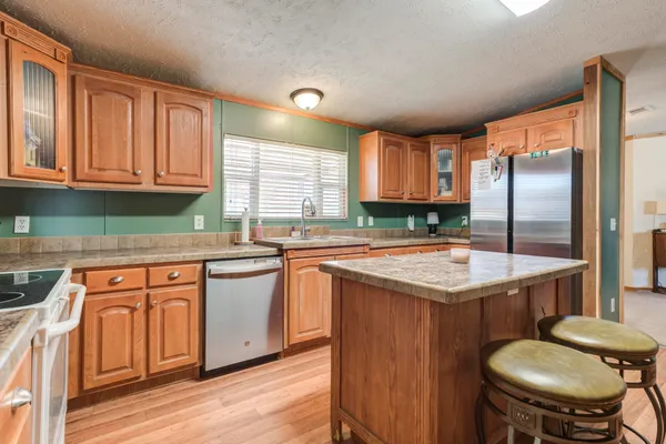 a workspace with furniture and window