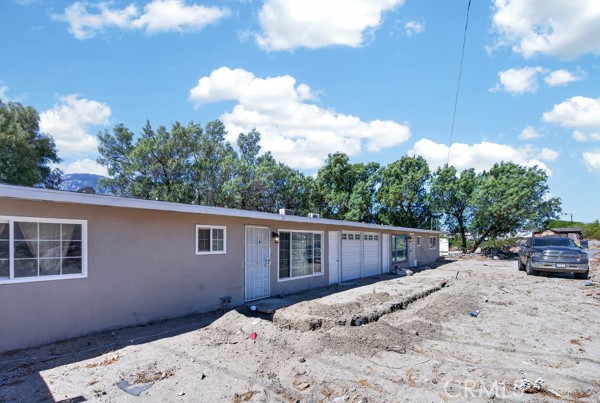 13391 Mesquite Road Whitewater, CA 92282 - Photo 2 of 27 a view of house with backyard and seating space