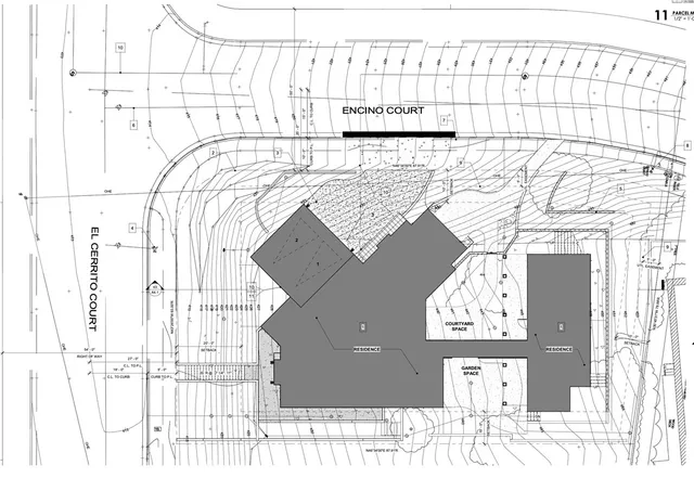 a black and white photo of a living room