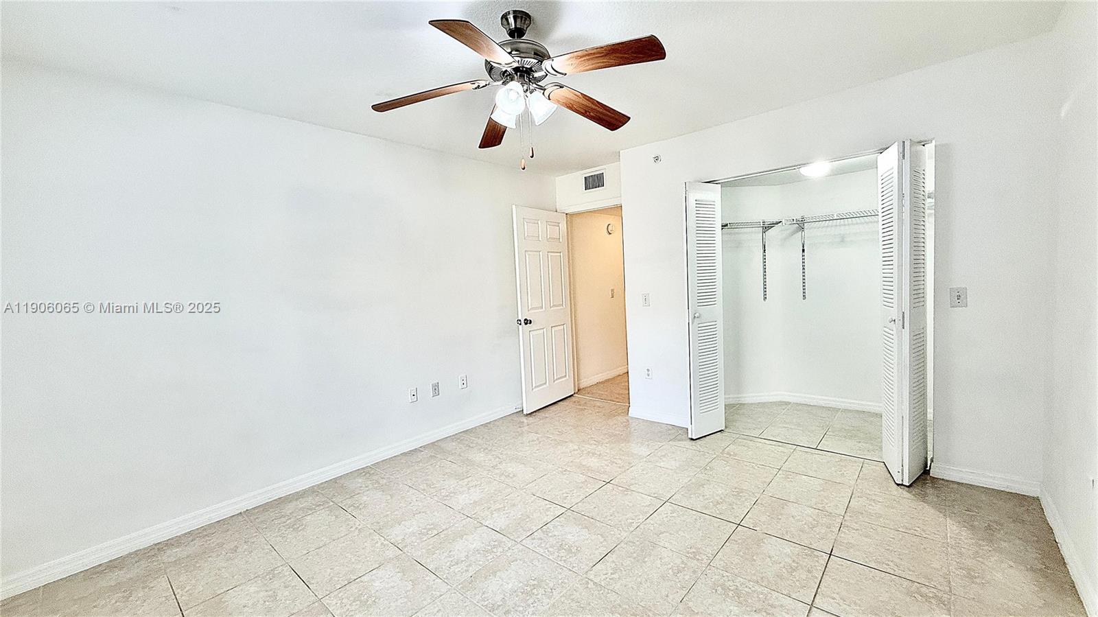 4211 San Marino Boulevard, Unit 205 West Palm Beach, FL 33409 - Photo 17 of 22 a view of an empty room