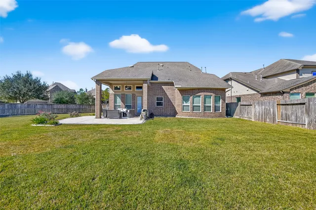 a view of a house with a swimming pool