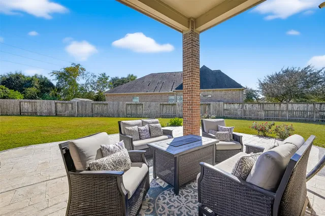 a view of outdoor space with playground and green space
