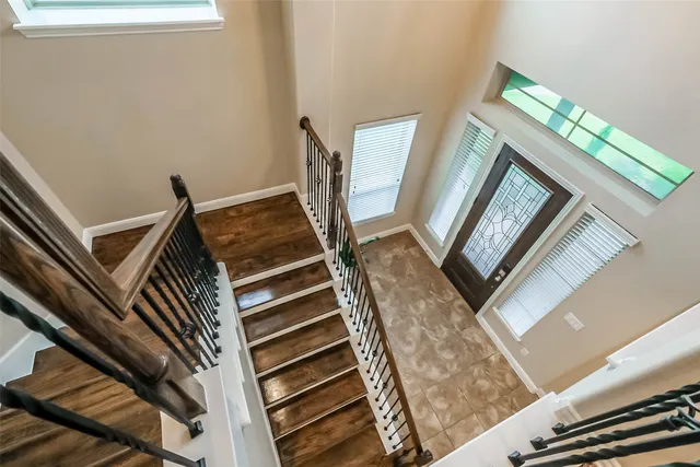 a kitchen with granite countertop a sink appliances and cabinets