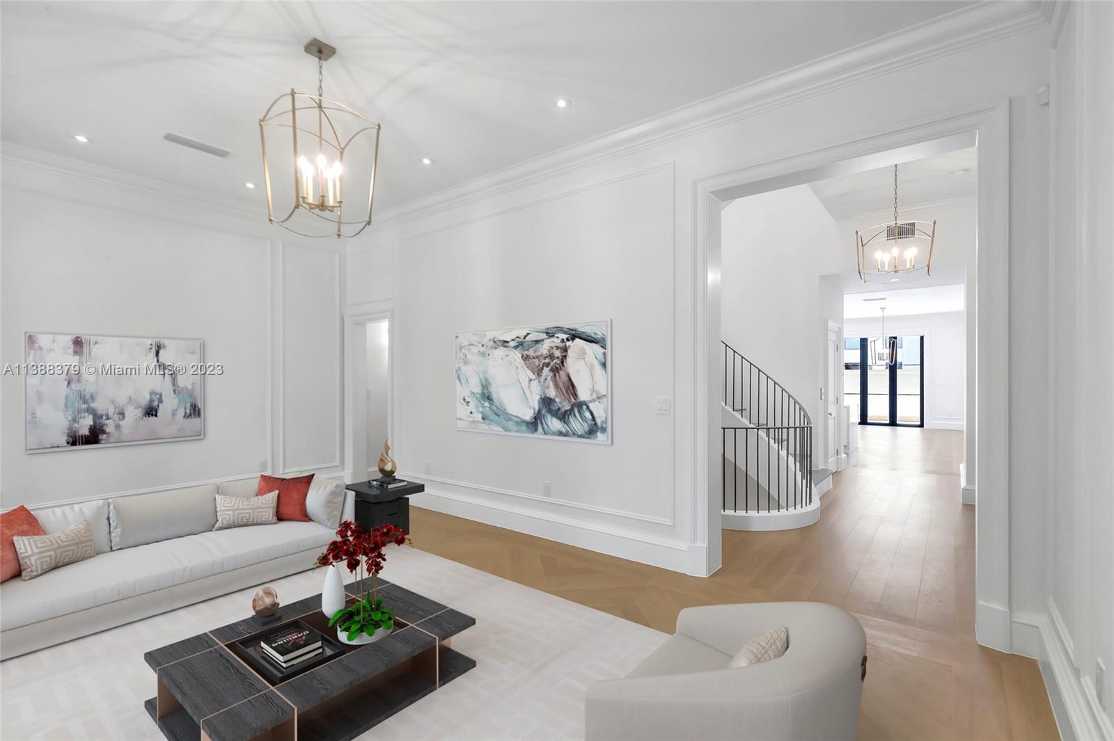 2607 Anderson Road Coral Gables, FL 33134 - Photo 57 of 96 a living room with furniture and a chandelier