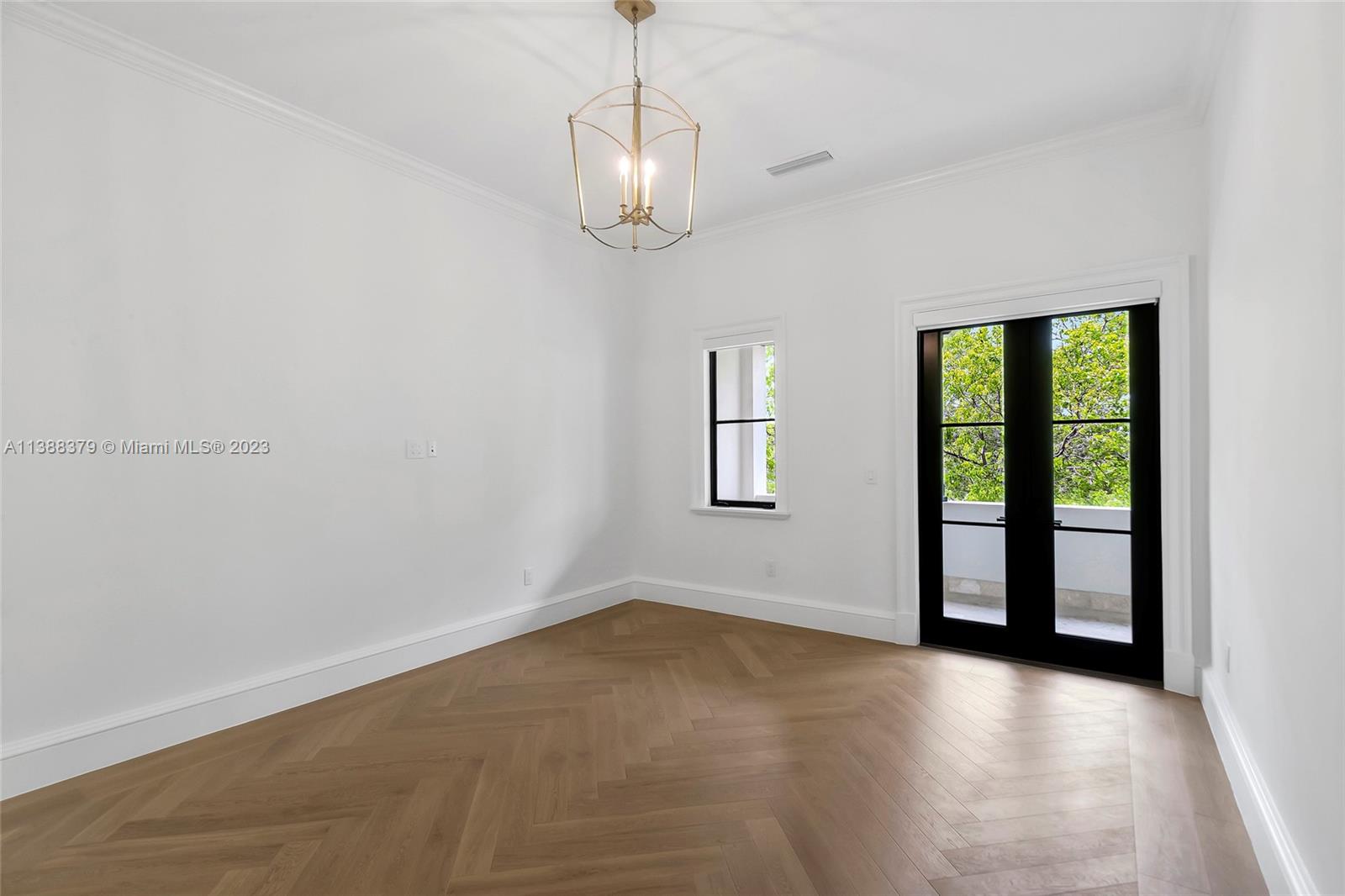 2607 Anderson Road Coral Gables, FL 33134 - Photo 61 of 96 a view of an empty room with a window