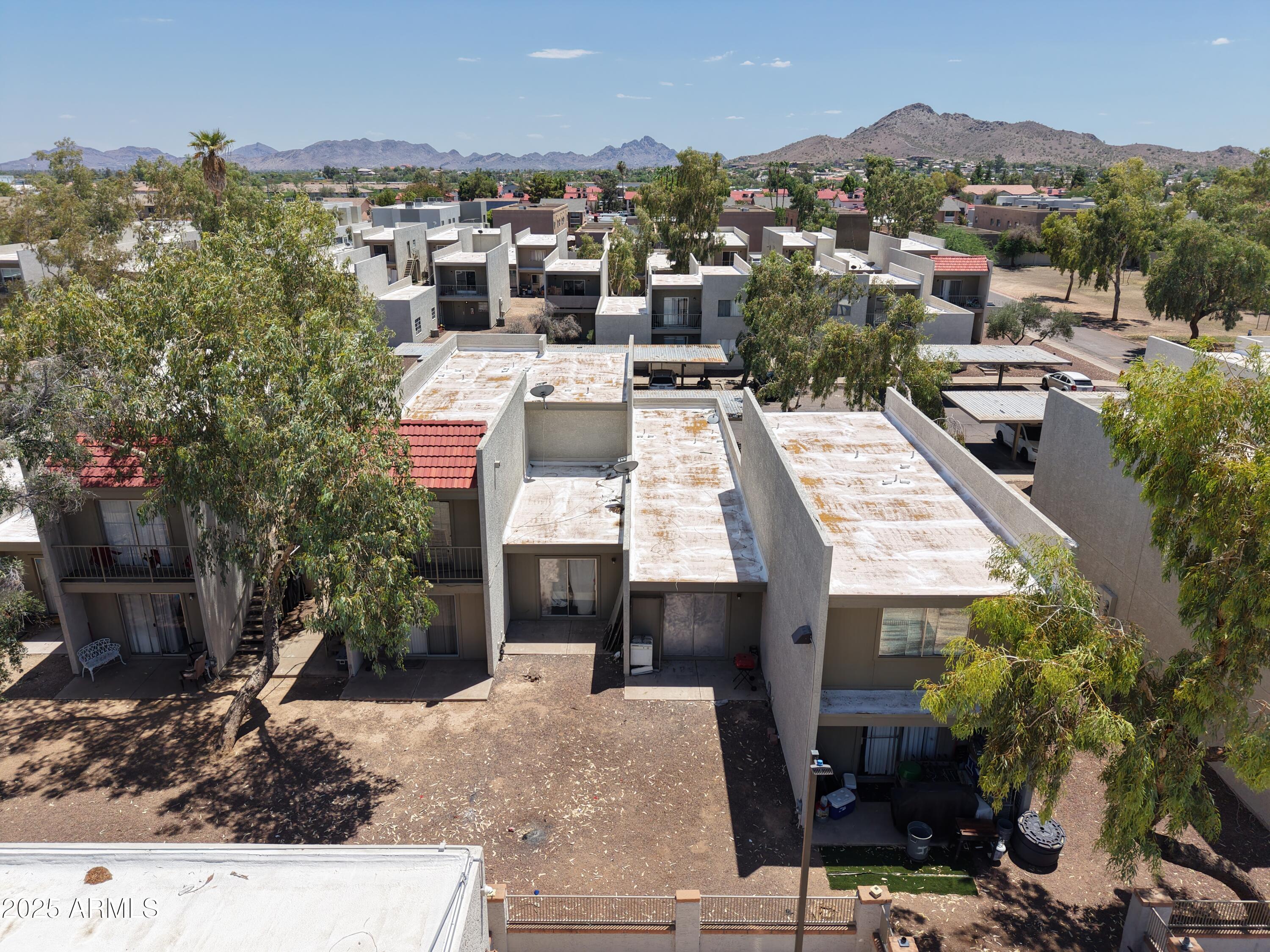 2822 East Kathleen Road Phoenix, AZ 85032 - Photo 1 of 30 a picture of a city with lots of buildings