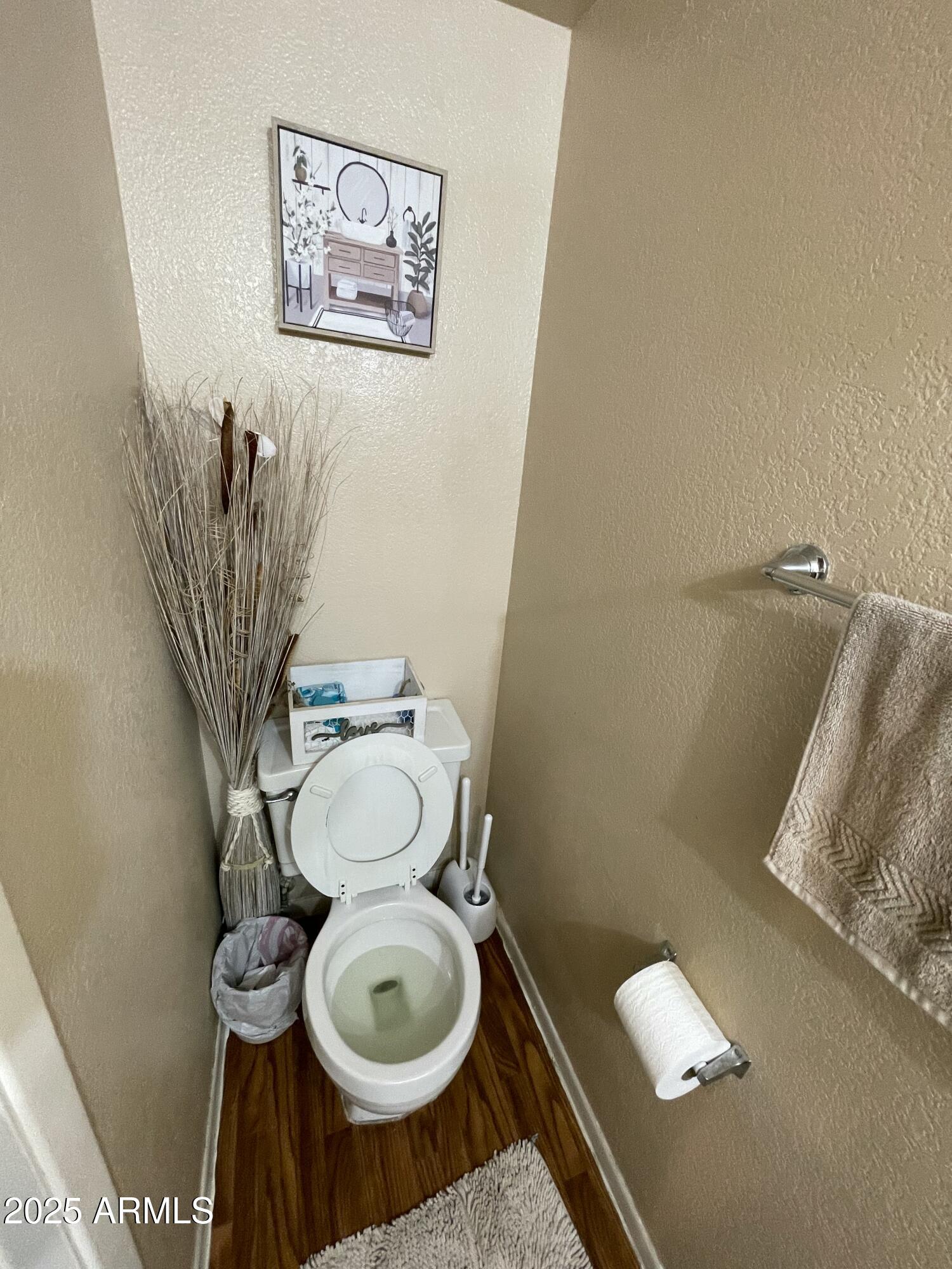 2822 East Kathleen Road Phoenix, AZ 85032 - Photo 17 of 30 a bathroom with a toilet and a mirror