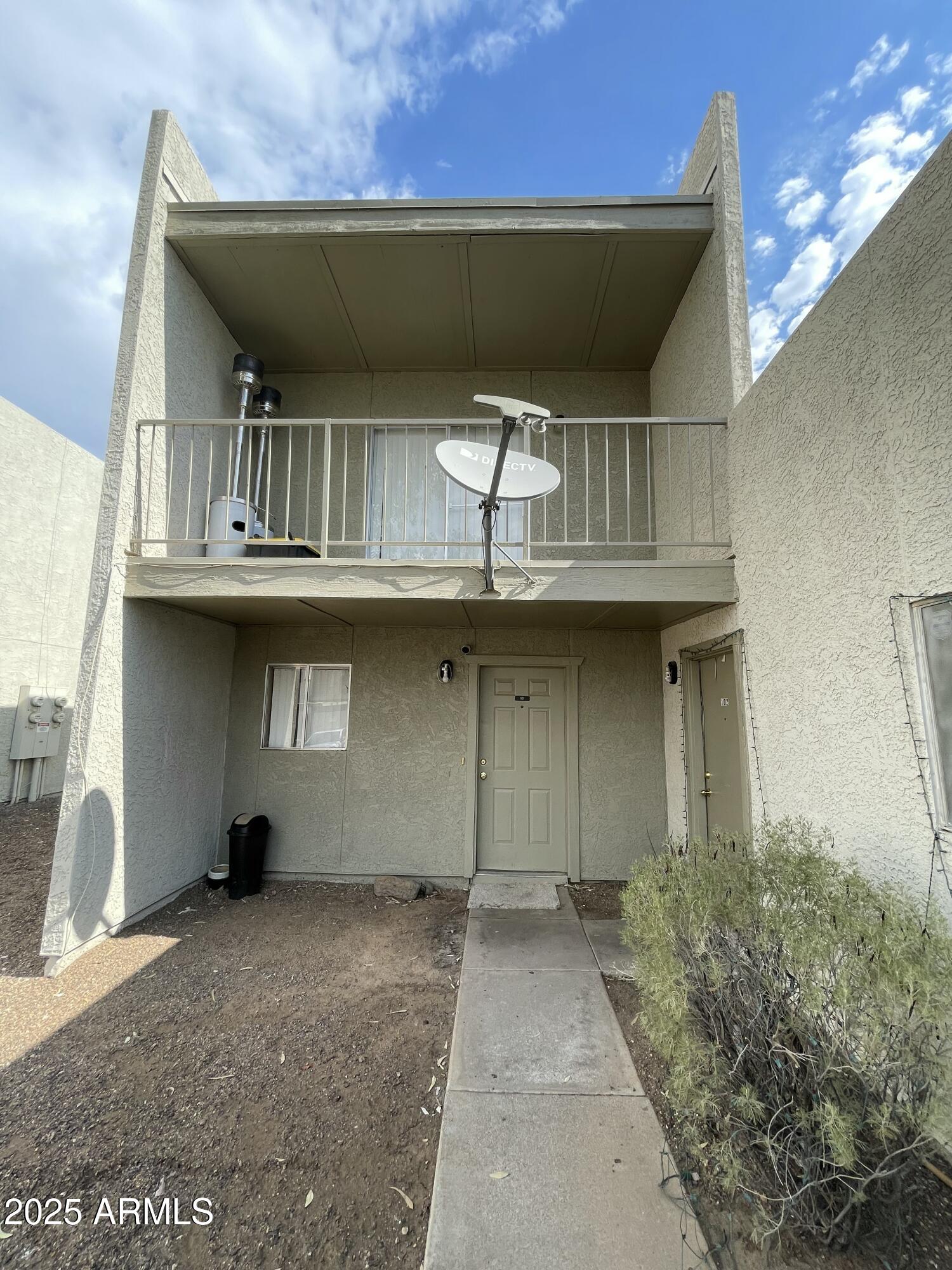 2822 East Kathleen Road Phoenix, AZ 85032 - Photo 20 of 30 a front view of a house with a garden
