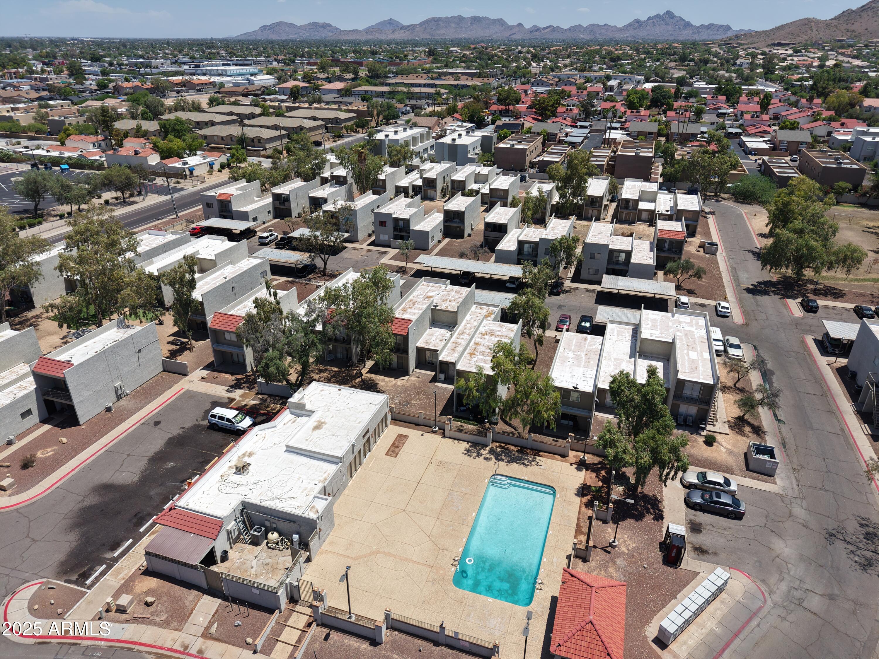 2822 East Kathleen Road Phoenix, AZ 85032 - Photo 2 of 30 an aerial view of a city with lots of residential buildings