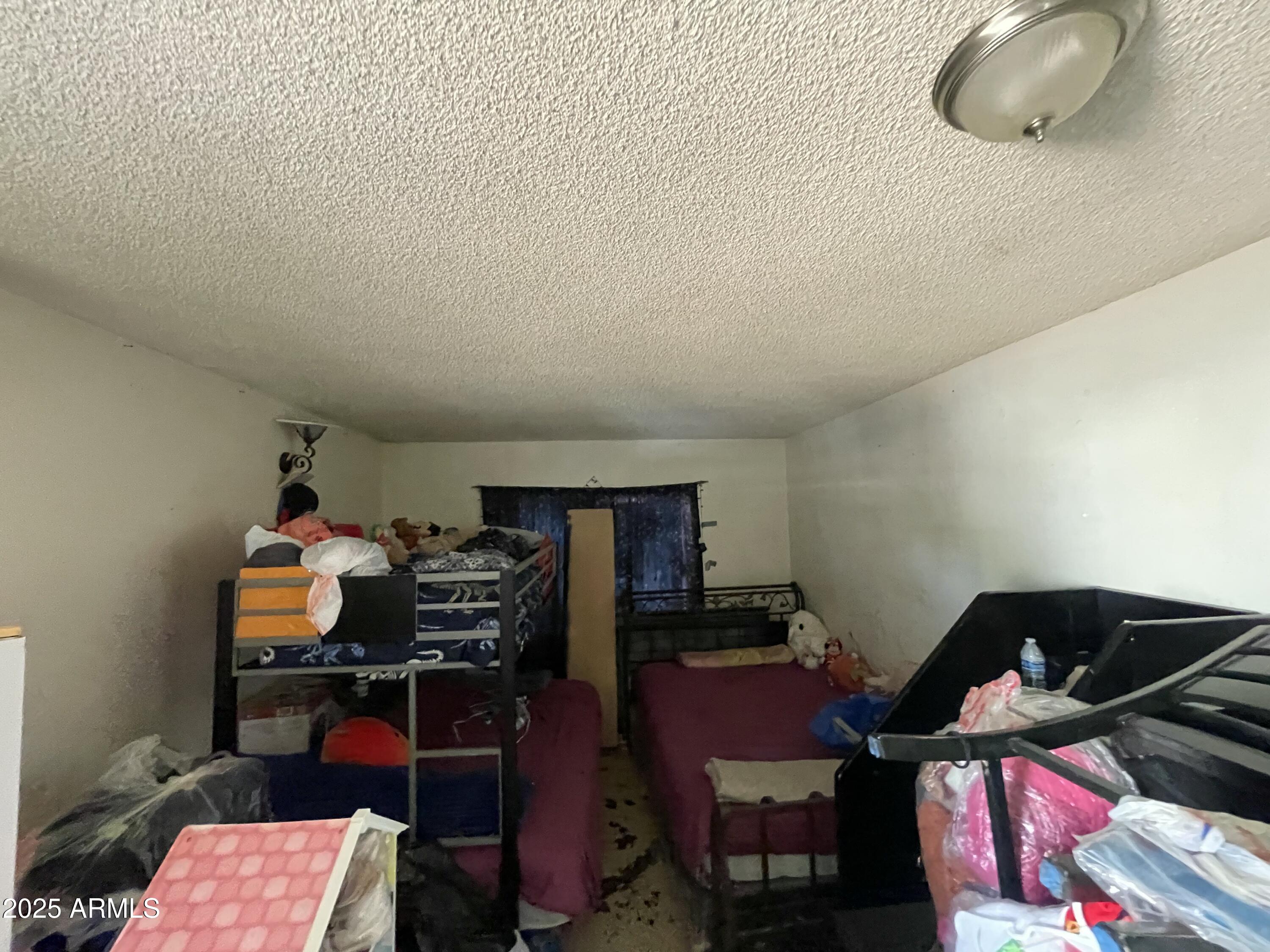 2822 East Kathleen Road Phoenix, AZ 85032 - Photo 21 of 30 a room with furniture