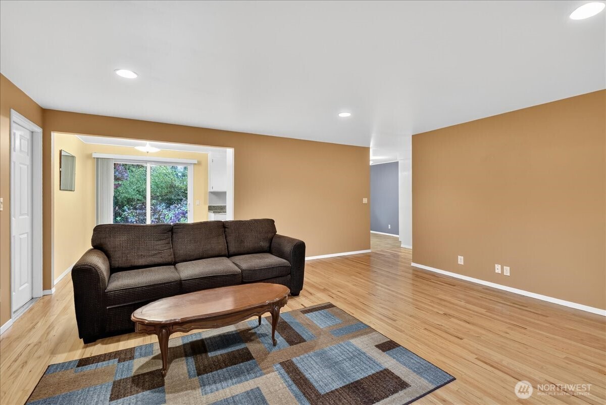 20721 81st Avenue West Edmonds, WA 98026 - Photo 4 of 25 a living room with furniture and a large window