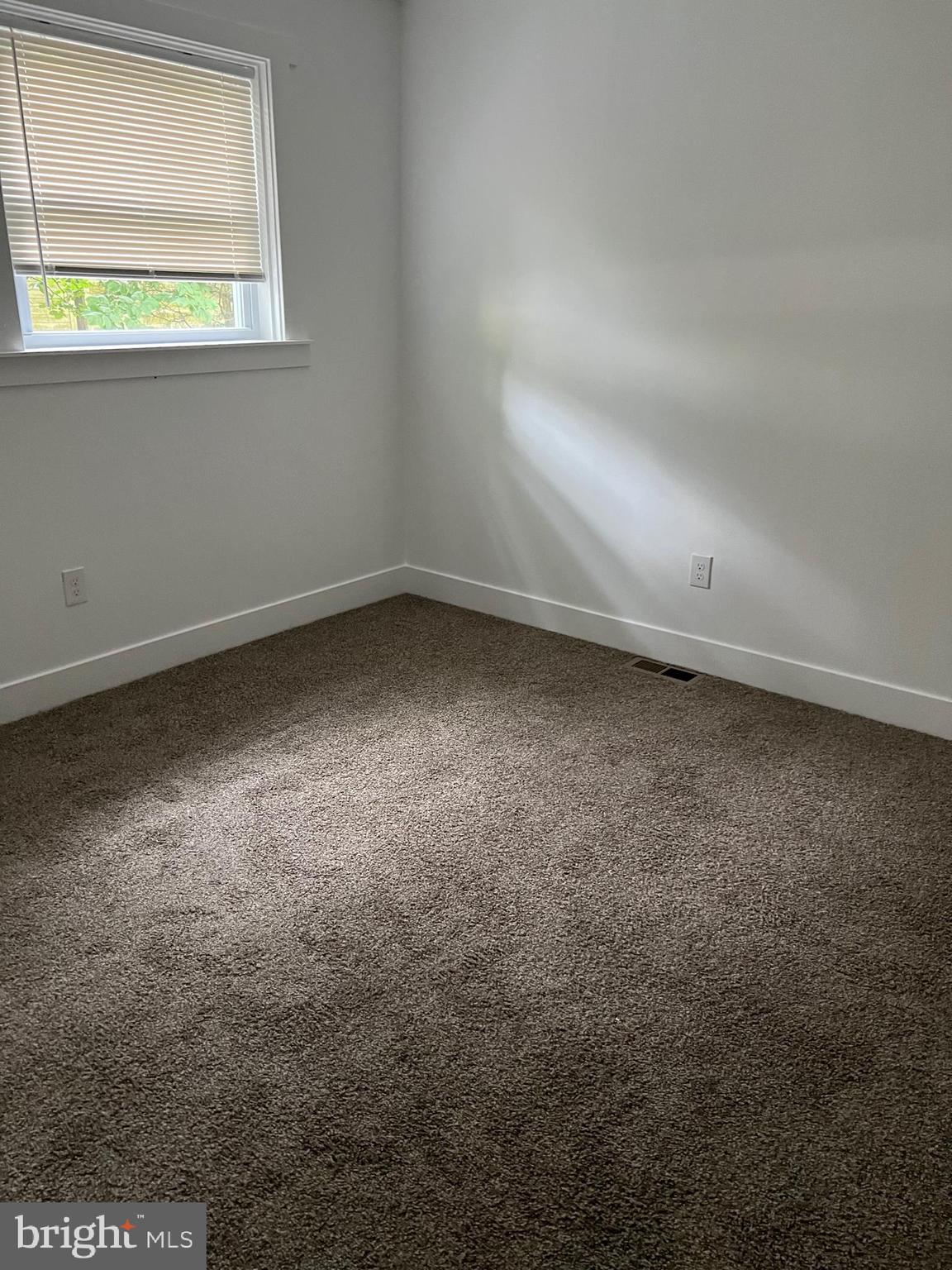 1024 Crestview Avenue Reading, PA 19607 - Photo 8 of 11 an empty room with a window