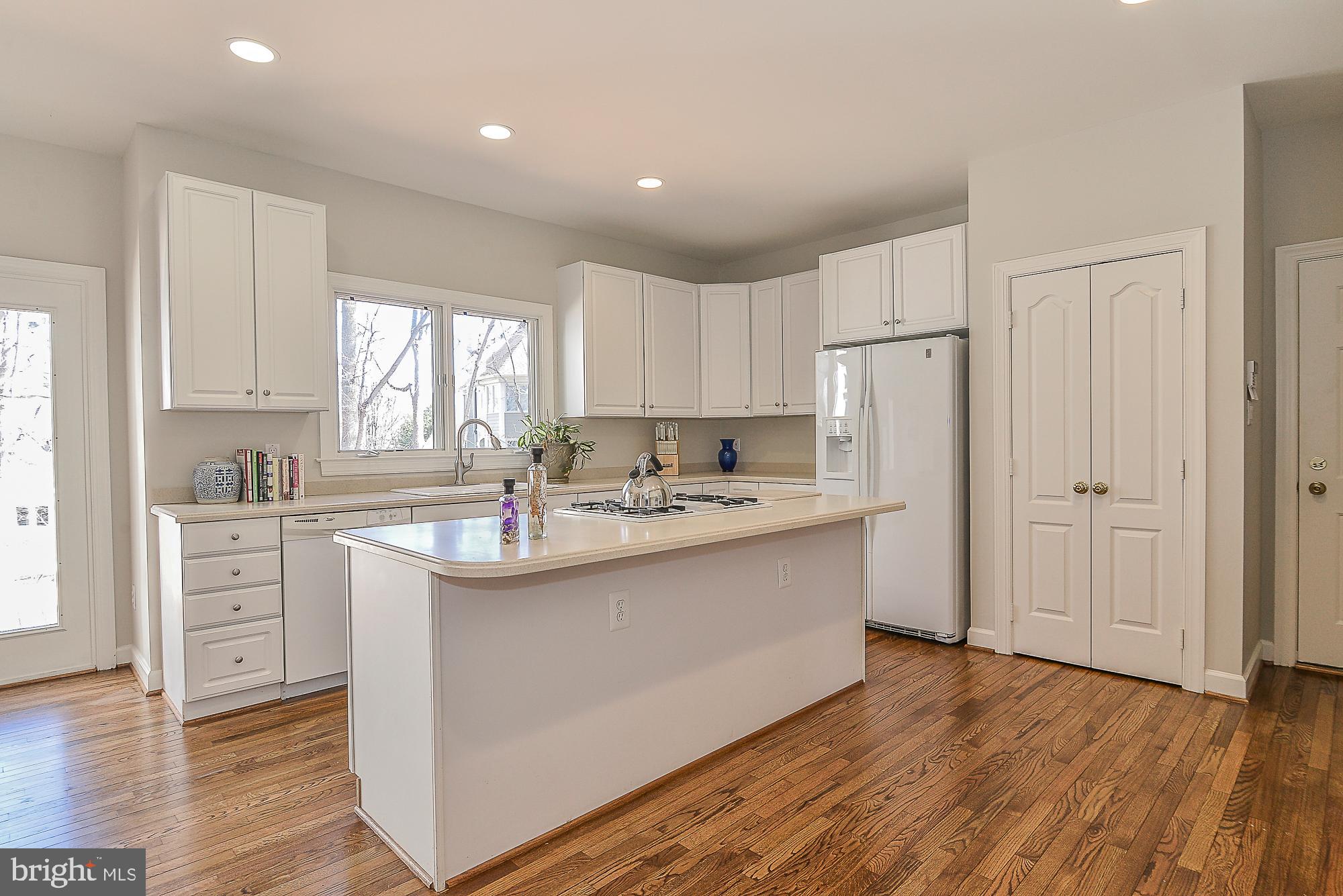 11330 Bright Pond Lane Reston, VA 20194 - Photo 14 of 47 Corian Countertops, GE, and Jenn Air Appliances