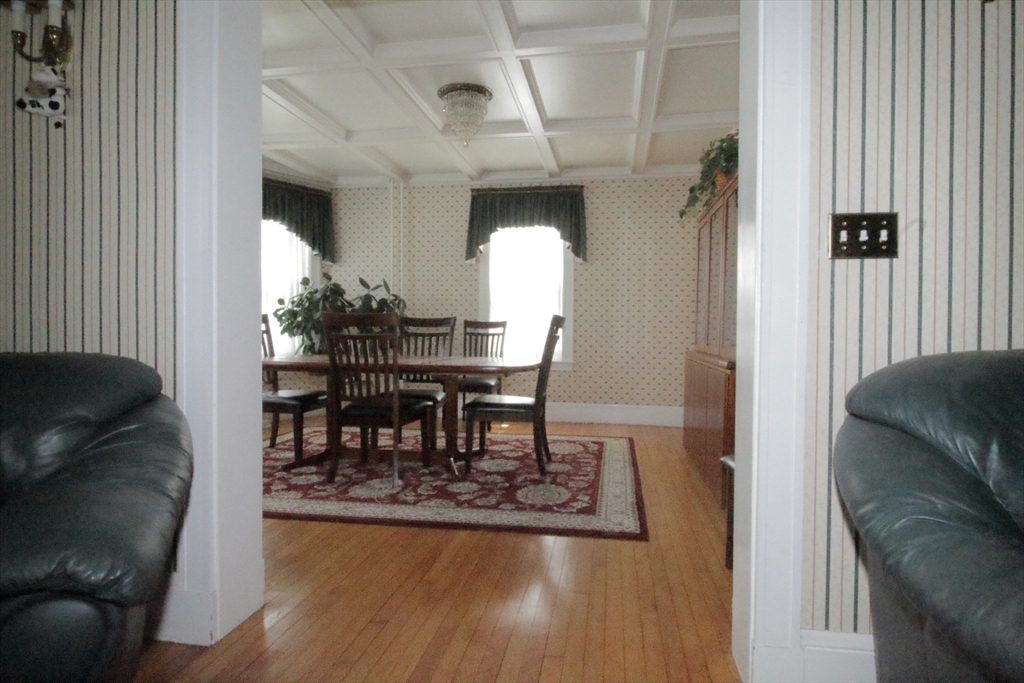 36 Kimball Road Chelsea, MA 02150 - Photo 11 of 24 a living room with furniture and wooden floor