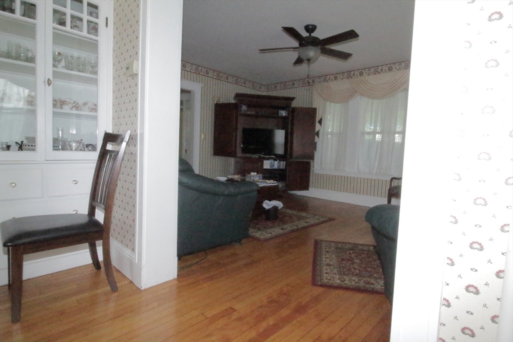 36 Kimball Road Chelsea, MA 02150 - Photo 12 of 24 a view of a livingroom with furniture and a ceiling fan