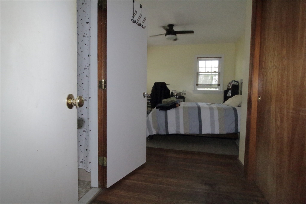 36 Kimball Road Chelsea, MA 02150 - Photo 16 of 24 a bed room with a bed and a window