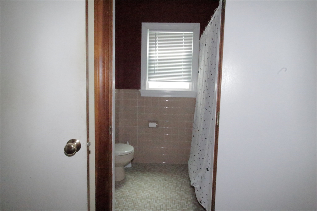 36 Kimball Road Chelsea, MA 02150 - Photo 17 of 24 a bathroom with a granite countertop sink