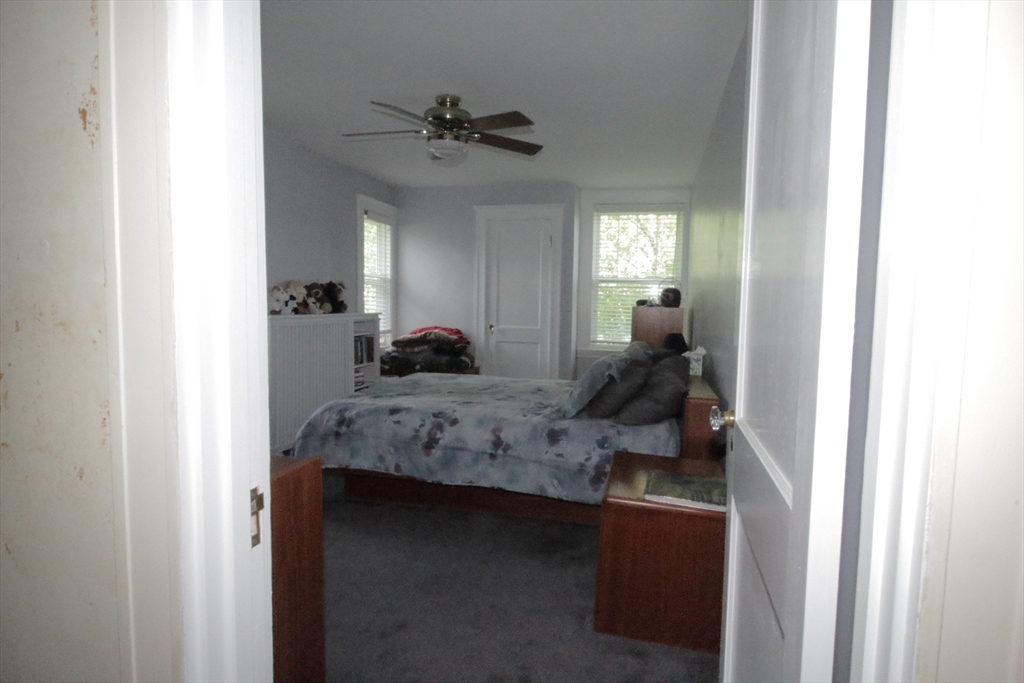 36 Kimball Road Chelsea, MA 02150 - Photo 22 of 24 a living room with furniture and a window