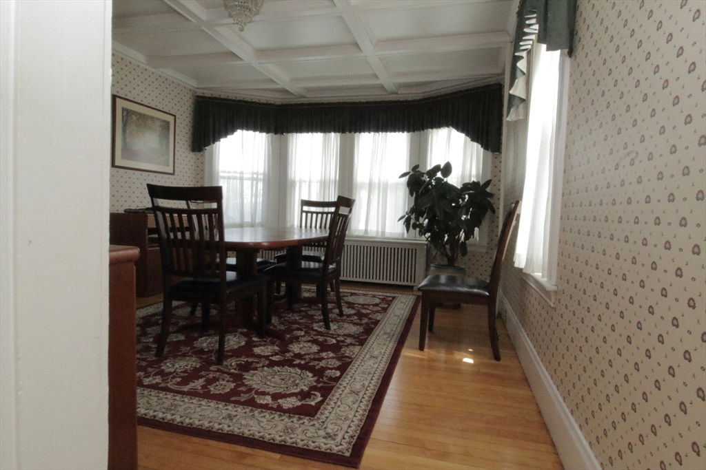 36 Kimball Road Chelsea, MA 02150 - Photo 10 of 24 a dining room with furniture window and wooden floor