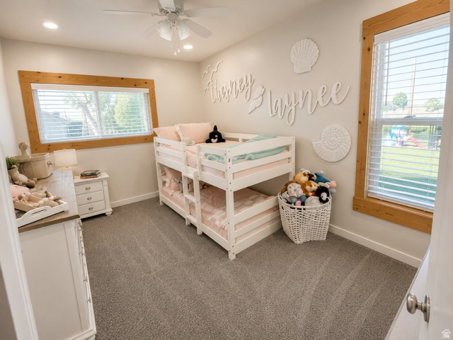 303 North Main Street Grace, ID 83241 - Photo 13 of 22 Carpeted room featuring a ceiling fan with light, two windows with wood-finish trim, and recessed lighting