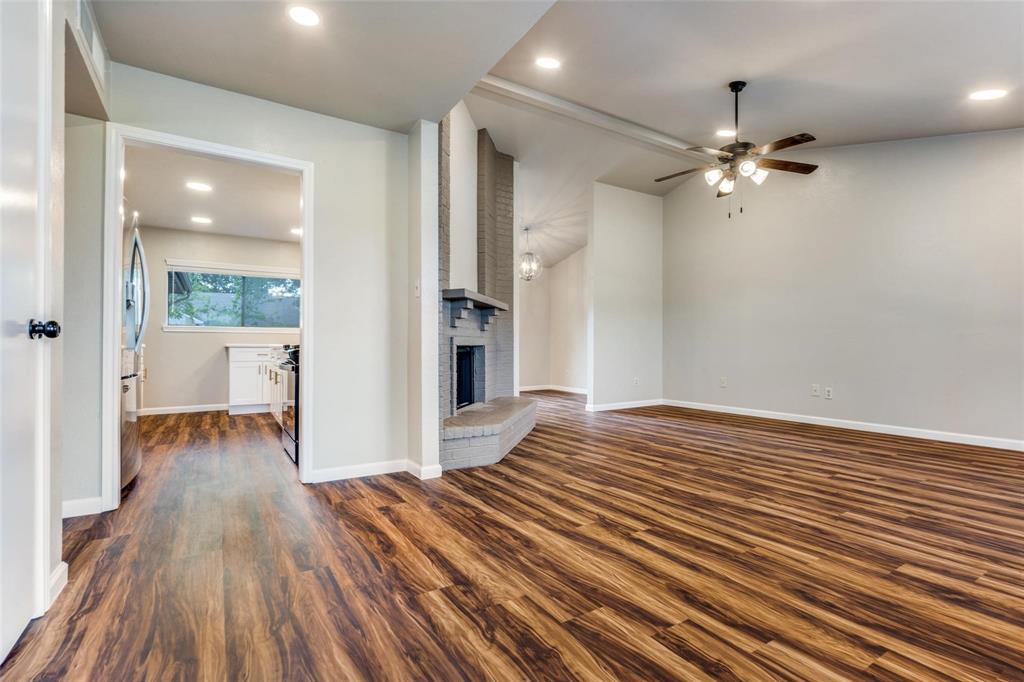 7904 Simpkins Place Plano, TX 75025 - Photo 2 of 24 wooden floor in an empty room with a window
