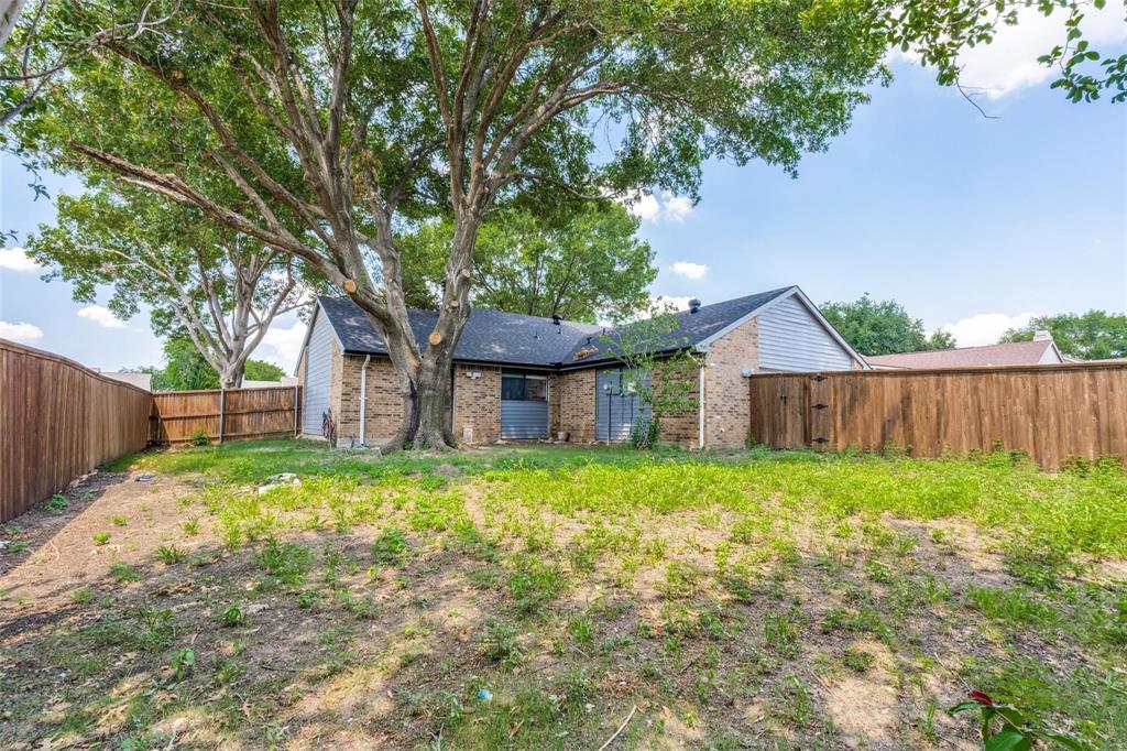7904 Simpkins Place Plano, TX 75025 - Photo 23 of 24 a backyard of a house