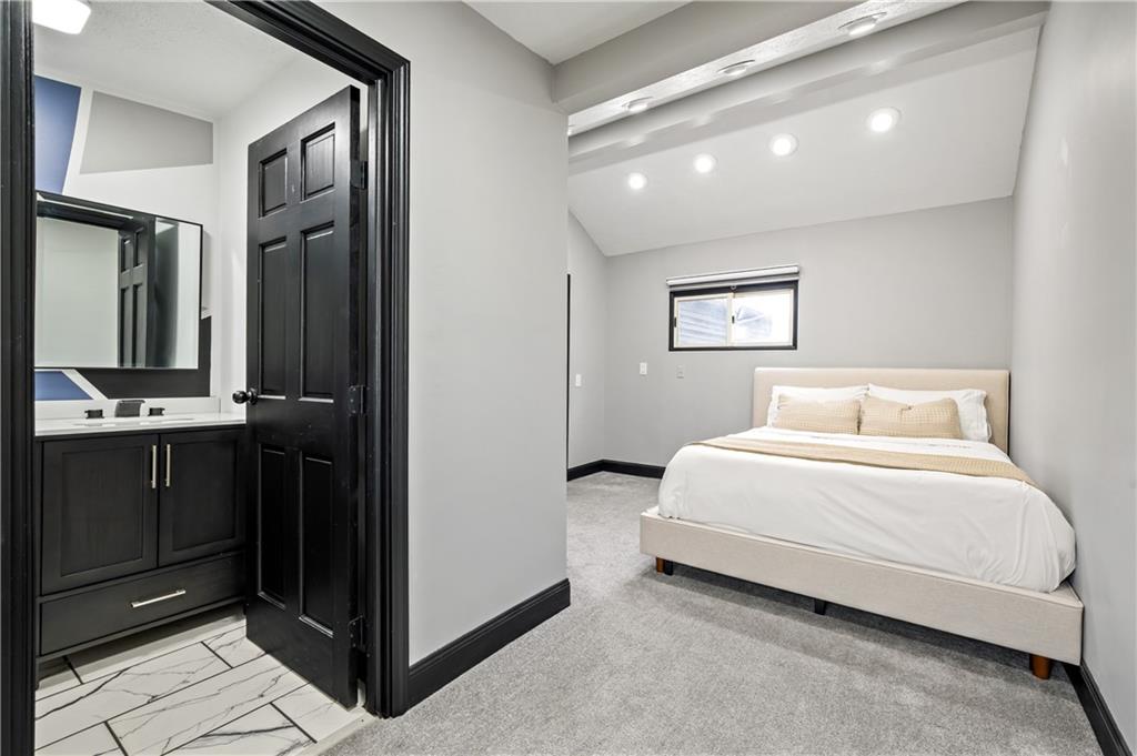 856 Cleveland Avenue Brackenridge, PA 15014 - Photo 21 of 35 a bedroom with a bed and a mirror