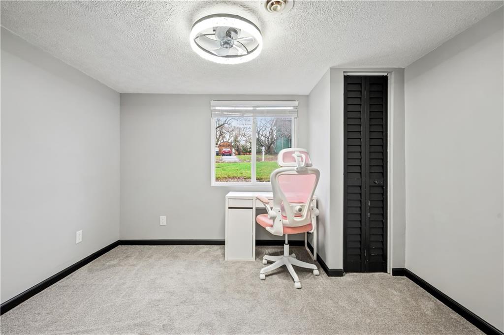 856 Cleveland Avenue Brackenridge, PA 15014 - Photo 25 of 35 a view of a room with a window and chair