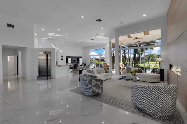 a living room with furniture and a table