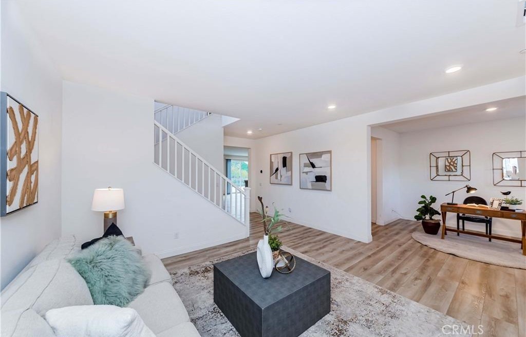 20886 Mountain Gate Drive Riverside, CA 92507 - Photo 7 of 27 a living room with furniture and a table
