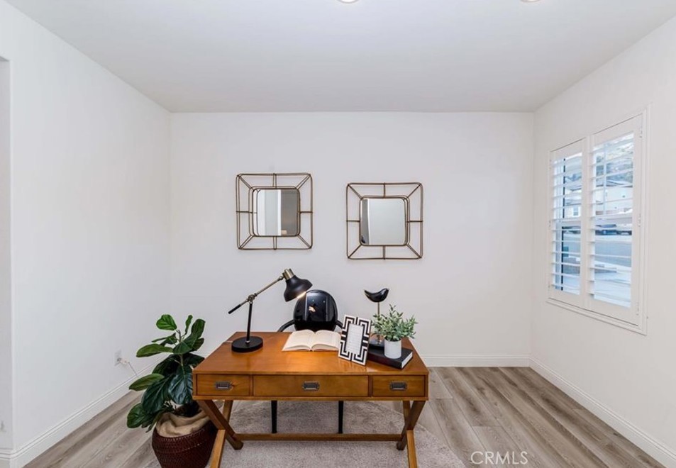 20886 Mountain Gate Drive Riverside, CA 92507 - Photo 10 of 27 a living room with furniture and flowers