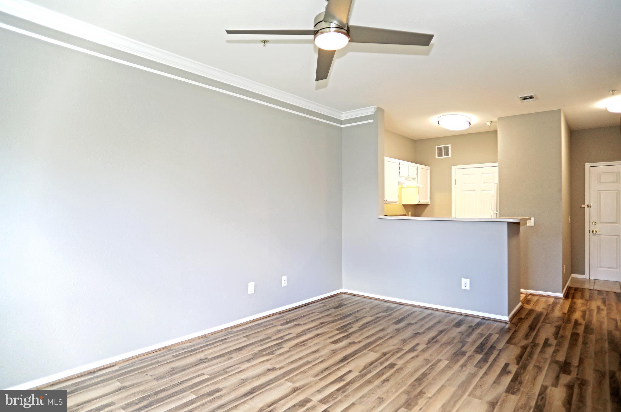 1601 Spring Gate Dr., Unit 1202 McLean, VA 22102 - Photo 12 of 30 a view of a livingroom with a hardwood
