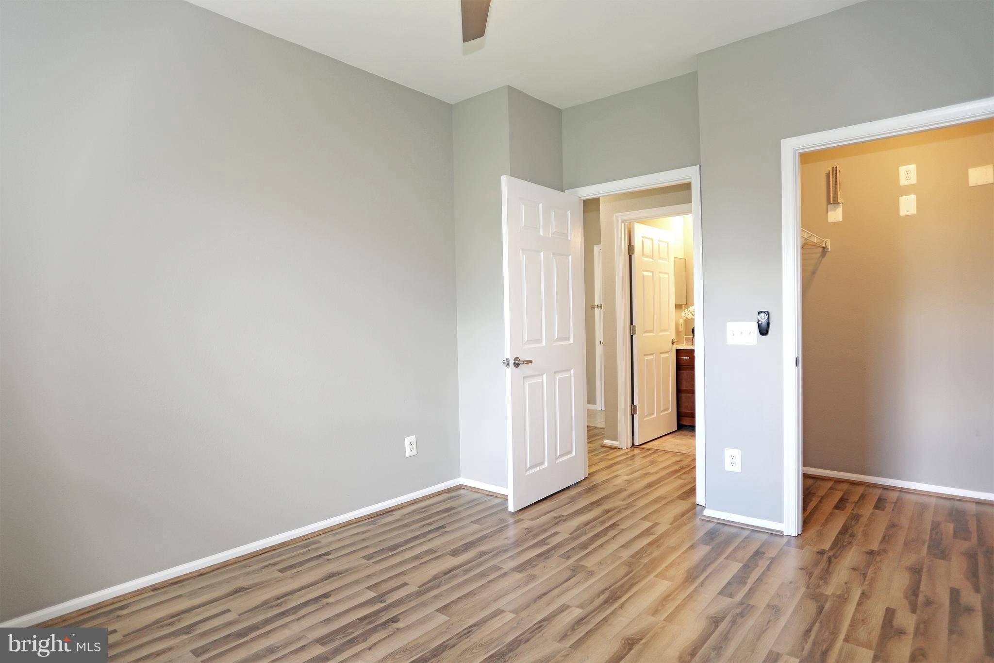 1601 Spring Gate Dr., Unit 1202 McLean, VA 22102 - Photo 14 of 30 wooden floor in an empty room