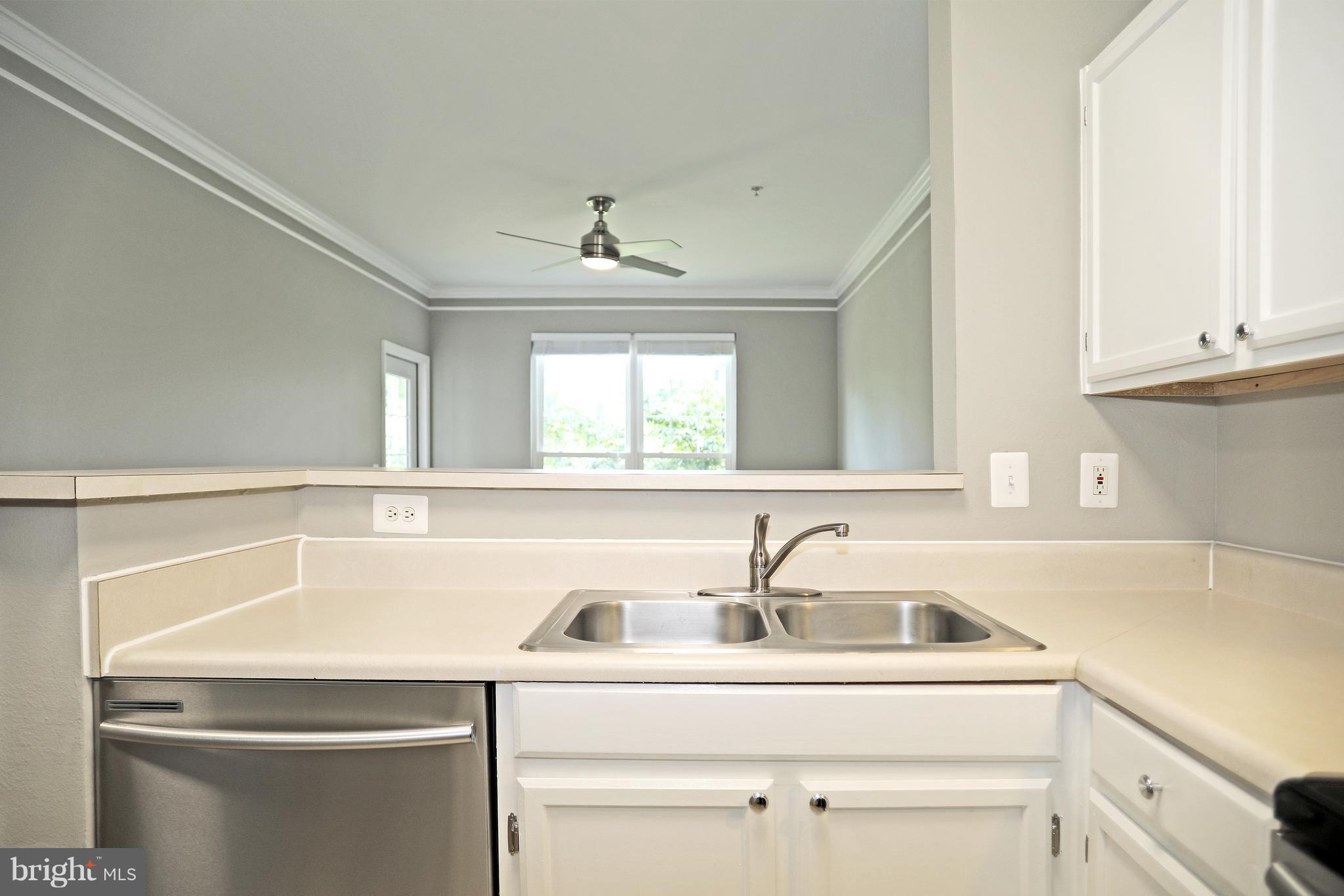 1601 Spring Gate Dr., Unit 1202 McLean, VA 22102 - Photo 5 of 30 a close view of sink and tap